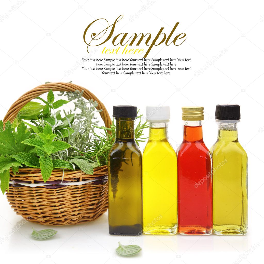 Fresh herbs in wicker basket, essential oils and herbal essences 