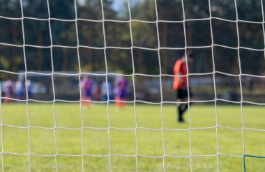 Futbol oyunu Arena Futbol ağlar aracılığıyla. Bulanık oyuncular arka plan