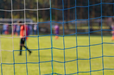 Futbol oyunu Arena Futbol ağlar aracılığıyla. Bulanık oyuncular arka plan