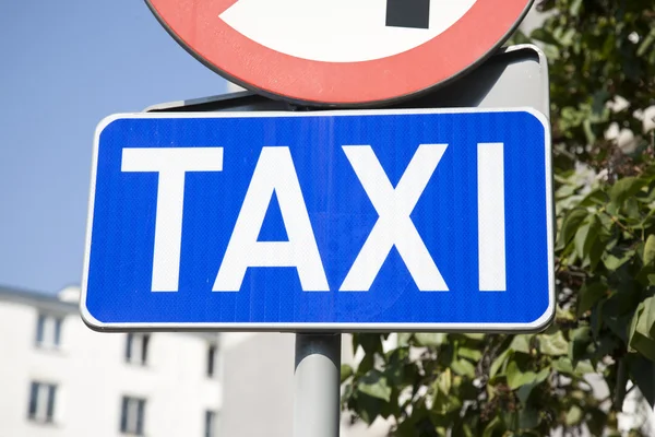Signe de taxi bleu — Photo