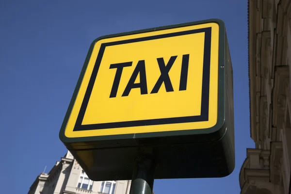 Gul taxi tecken — Stockfoto