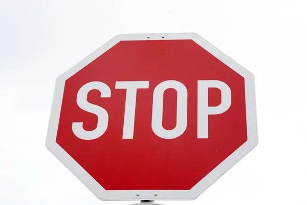 Sinal de trânsito stop vermelho — Fotografia de Stock