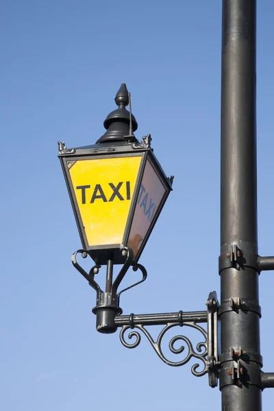 Gul taxi tecken — Stockfoto