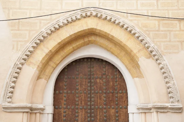 Kyrkliga dörren, santa cruz kvarter, Sevilla — Stockfoto