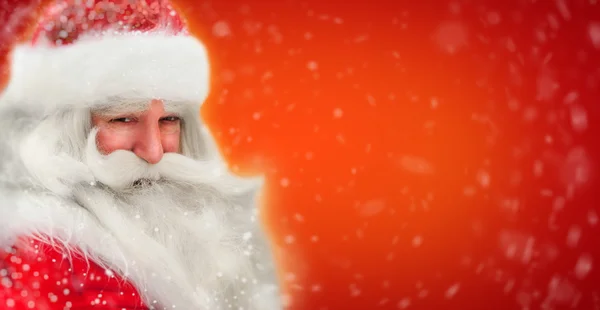 Santa claus portrét, usmívá se sněžení — Stock fotografie