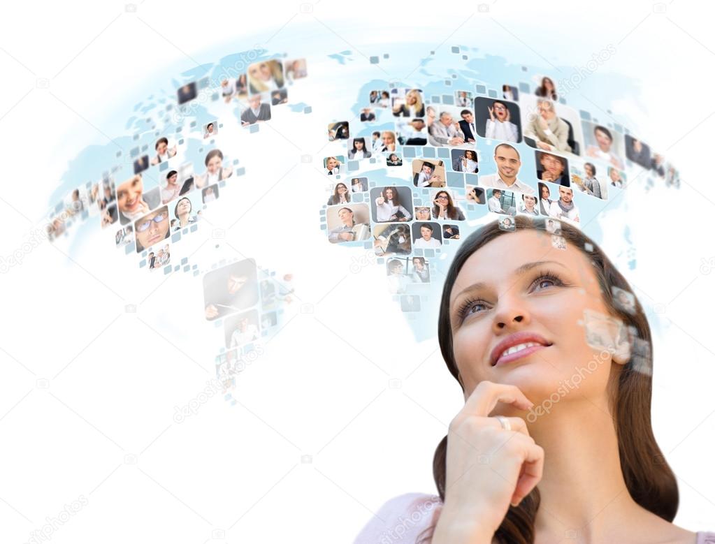Young successful woman looking at worldmap with profile photos