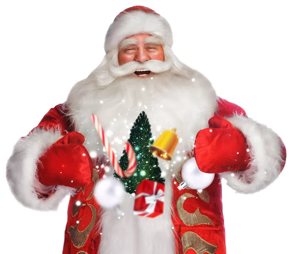 Skrattar jultomten stående på vita backgound och gör magi — Stockfoto