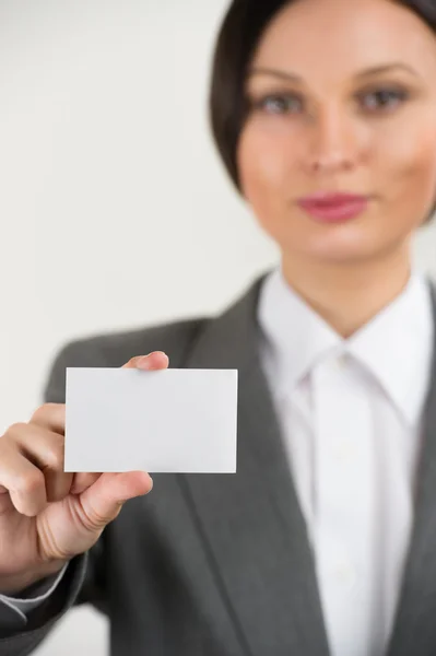Young businesswoman showing her blank business card — Stock Photo, Image