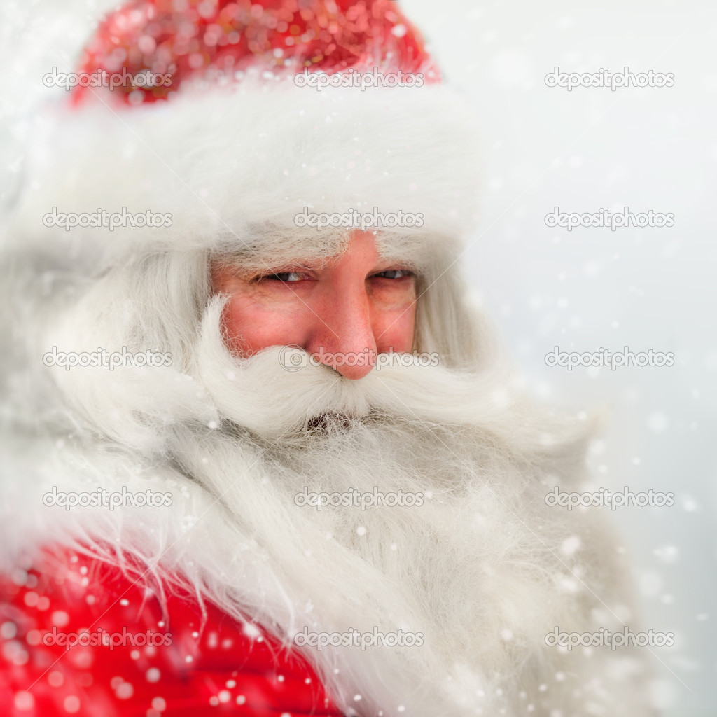 Santa Claus portrait smiling in snowfall