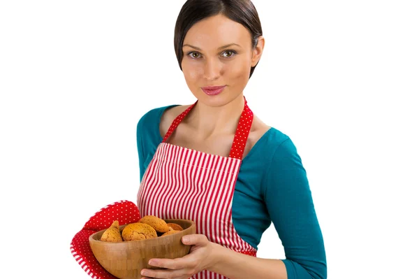 Young pretty woman holdin tasty fresh oatmeal cookies. — Stock Photo, Image