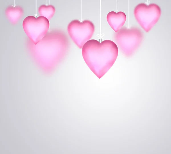 Valentinshintergrund mit hängenden rosa glänzenden Herzen — Stockfoto