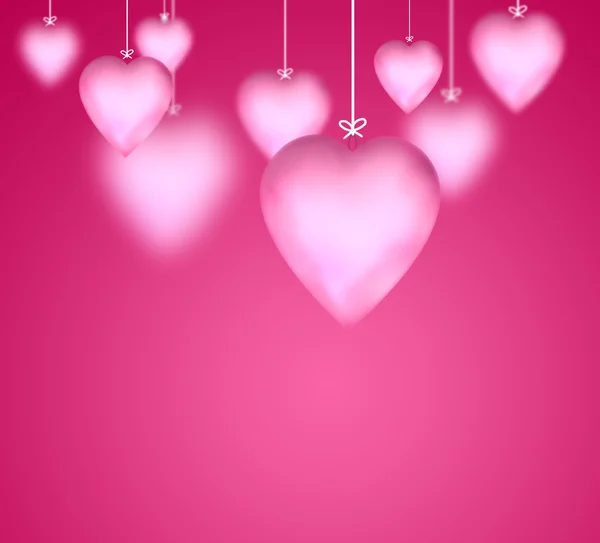 Valentine background with hanging pink glossy hearts — Stock Photo, Image