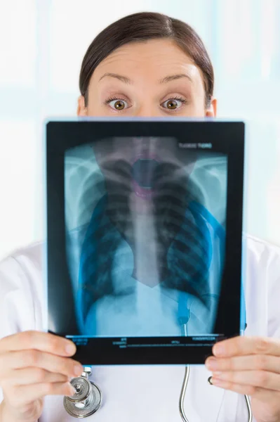 Surprised and very excited female doctor — Stock Photo, Image