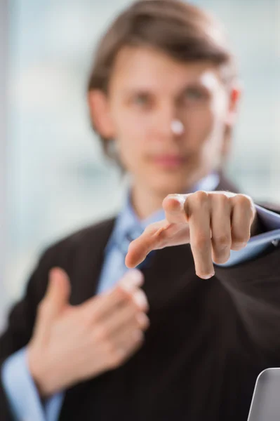 Portrait of adult business man pointing at you at his office — Stock Photo, Image