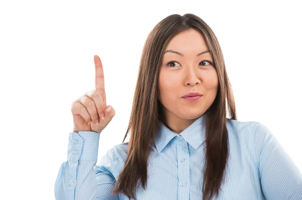 Young asian business woman pointing up and having good idea — Stock Photo, Image