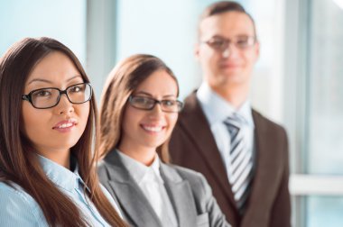 Group of a successful business standing together