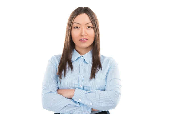 Uma jovem empresária bonita em pé sobre um fundo branco — Fotografia de Stock