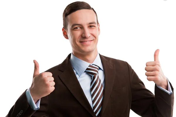 Portrait of a happy young business man showing thumbs up sign — Stock Photo, Image