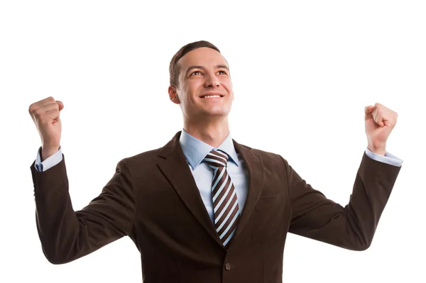 Business man throwing fists in air and smiling — Stock Photo, Image