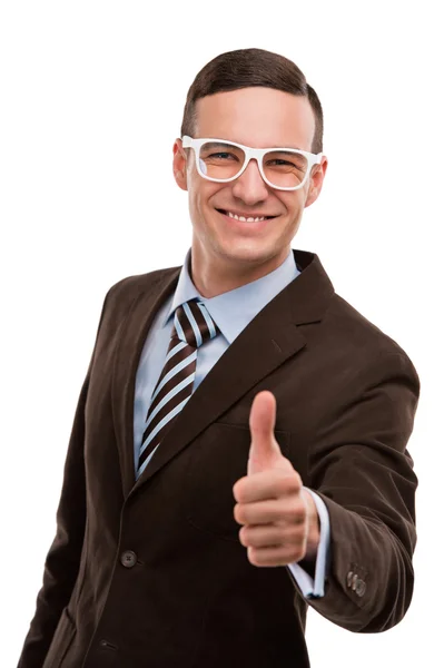 Portrait of a joyful young businessman gesturing thumb up sign — Stock Photo, Image