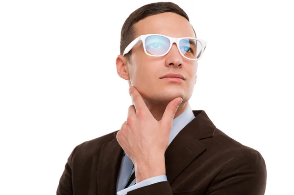 Young thoughtful businessman wearing glasses — Stock Photo, Image