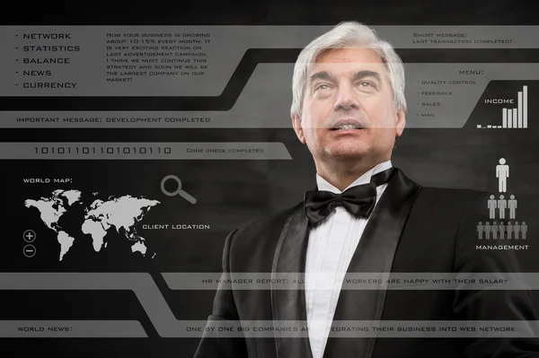 デジタル vurtual 画面を扱う黒のスーツのビジネスマン ストック写真