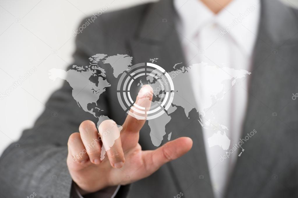 Business woman pointing her finger on virtual button on world ma