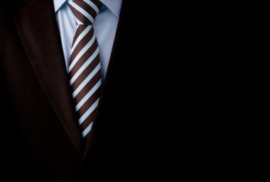 Black business suit with a tie and copyspace background