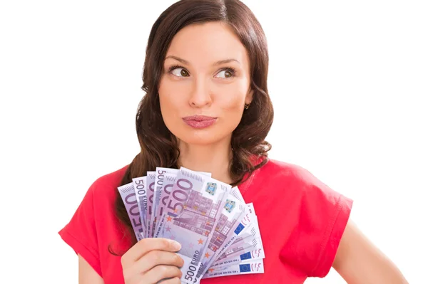 Woman holding and showing a lot of five hundred euro banknotes Royalty Free Stock Images