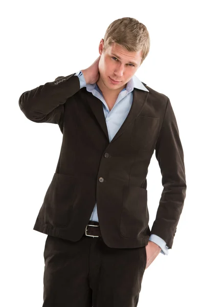 Portrait of a happy relaxed business man holding one hand on his neck — Stock Photo, Image