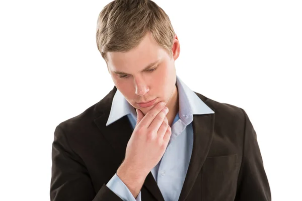 Portrait of a young business man looking away and thinking — Stock Photo, Image