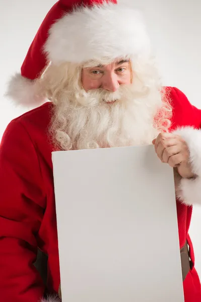 Weihnachtsmann mit weißem Blanko-Schild — Stockfoto