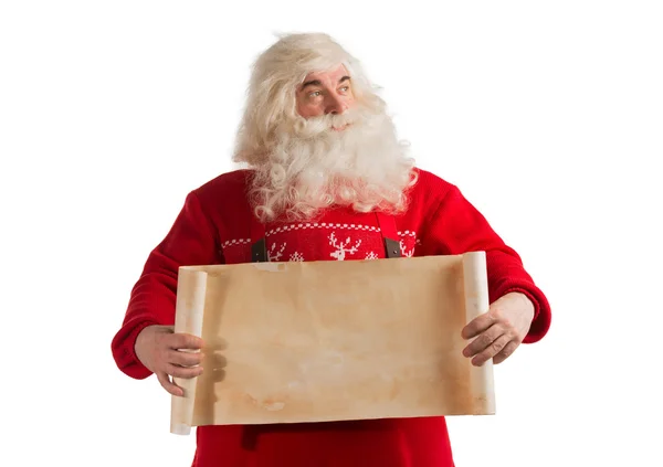 Santa Claus holding vintage paper blank sign — Stock Photo, Image