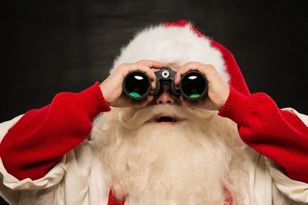 Papai Noel com binóculos — Fotografia de Stock