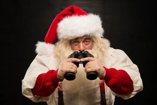 Santa Claus with binoculars — Stock Photo, Image