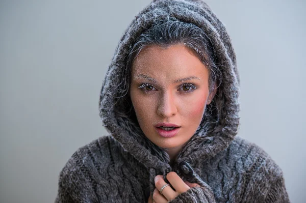 Mädchen mit Frost im Gesicht — Stockfoto