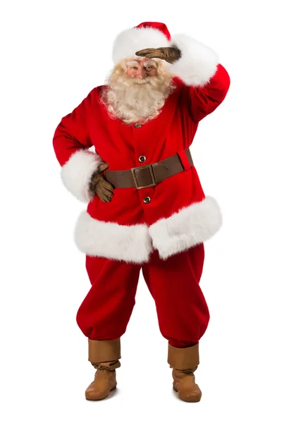 Papai Noel de pé e olhando para longe — Fotografia de Stock