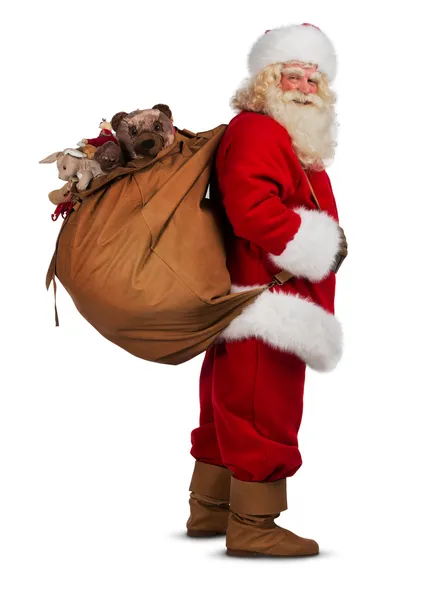 Babbo Natale che trasporta big bag — Foto Stock