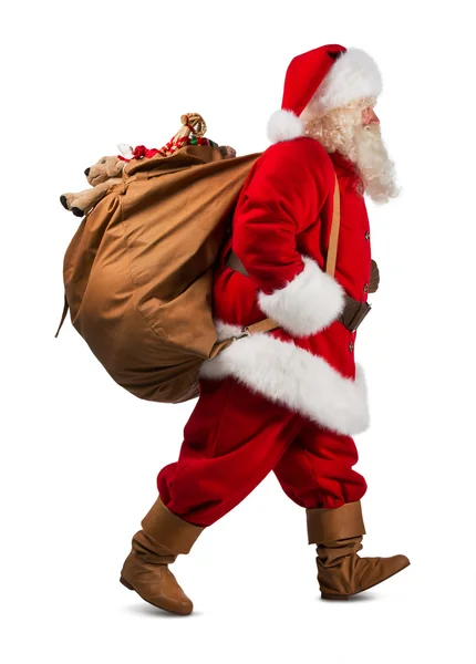 Santa Claus on the run to delivery christmas gifts — Stock Photo, Image