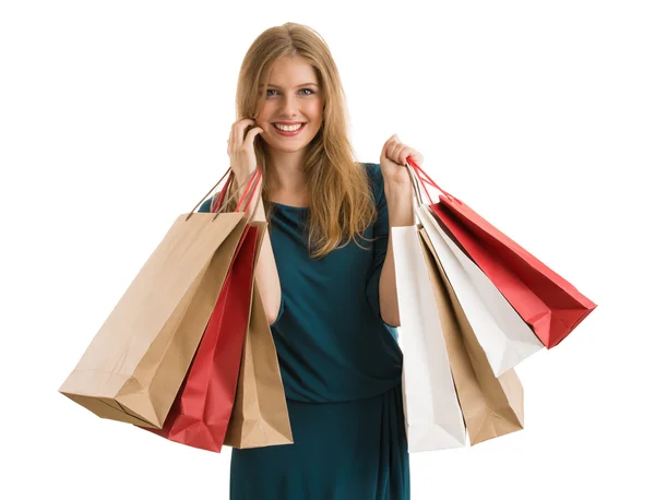 Kobieta zakupy torby na zakupy patrząc na kamery — Zdjęcie stockowe