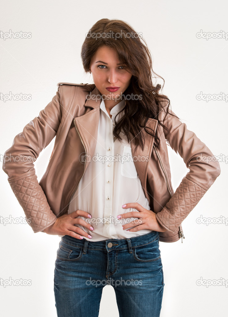 Portrait of an attractive fashionable young brunette woman hands
