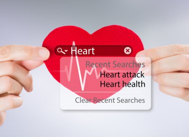 Female hands holding heart and heartbeat symbol with search engine and heart attack sign clipart
