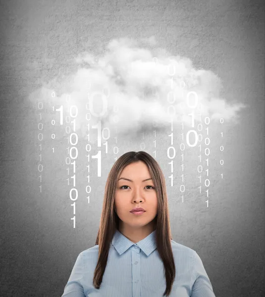 Young business woman or system administrator under cloud with digital rain. — Stock Photo, Image
