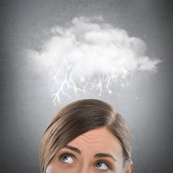 Close up of young woman looking up for thought bubble above her head with copy space — Stock Photo, Image