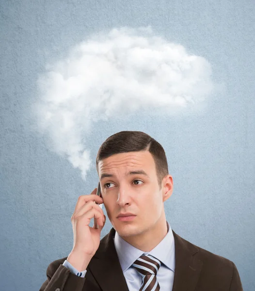 Businessman and cloud of thoughts — Stock Photo, Image