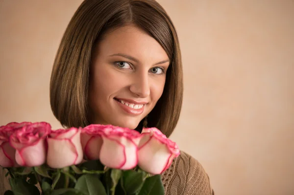 Woman with a large bouquet of roses — Stock Photo, Image