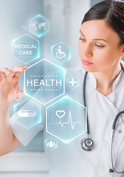 Doctor working with healthcare icons — Stock Photo, Image