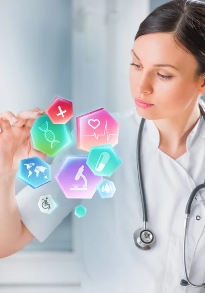Doctor working with healthcare icons — Stock Photo, Image