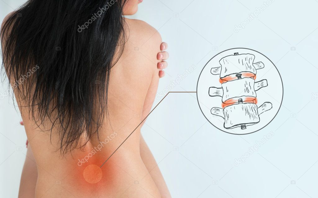 Woman having a pain in her back