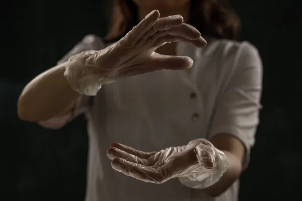 Female doctor holding something hands — Stock Photo, Image